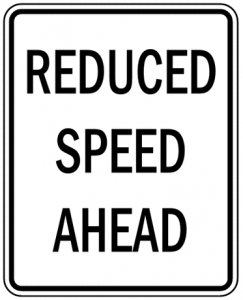 Fun Activities for Kids on Road Trips - Reduced Speed sign